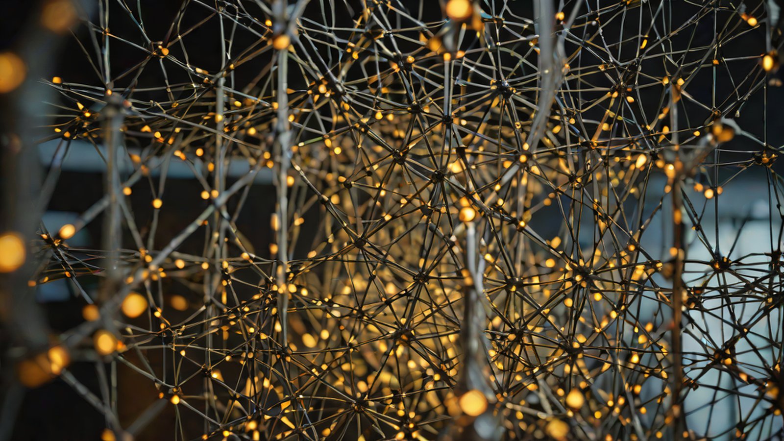 Code being automatically generated on a computer screen and transforming into a vibrant website